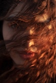 September 23, Redhead Appreciation Day, Person with red hair blowing in wind