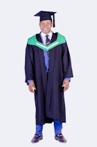 A welcoming contact page design featuring a graduation gown.