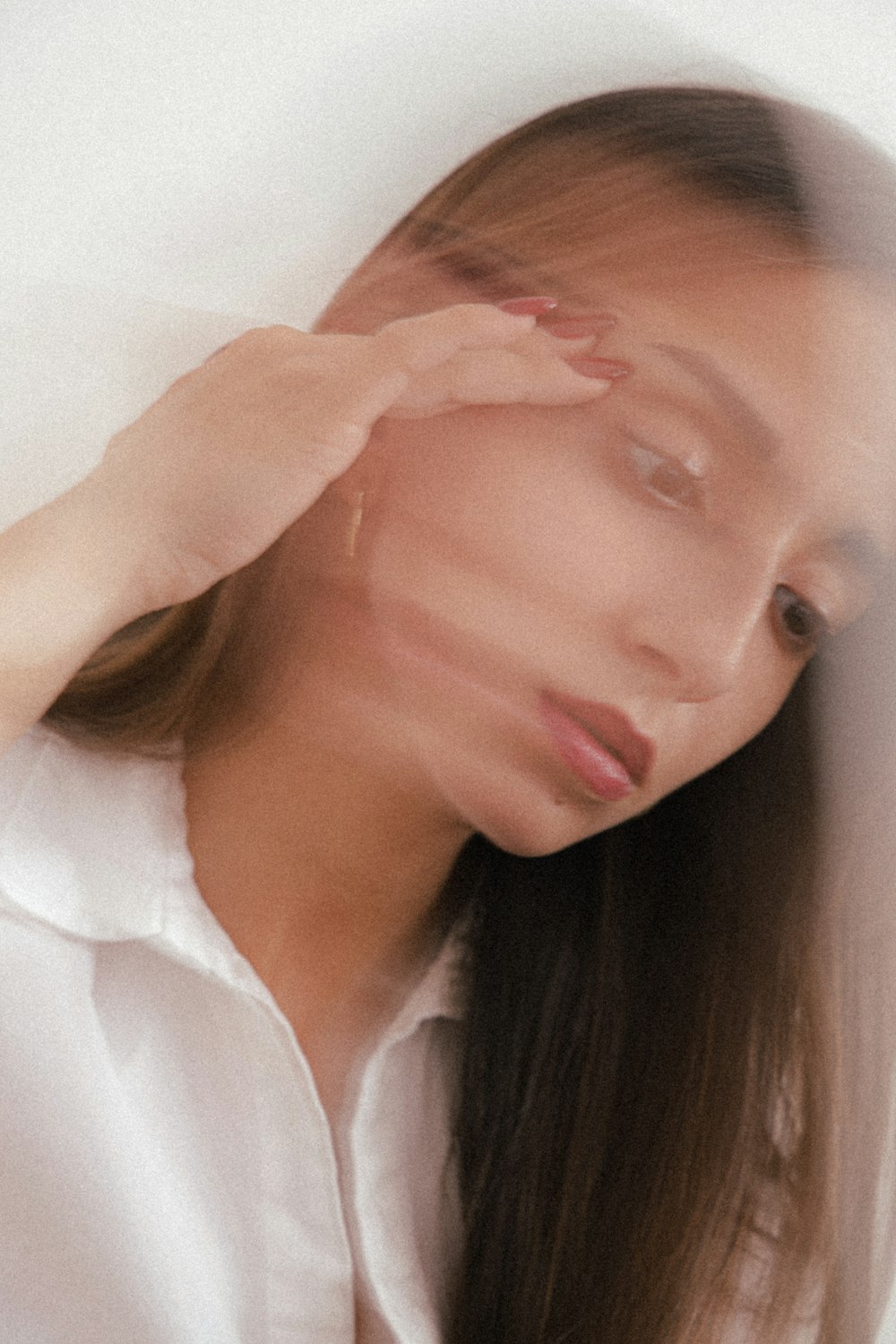 woman in white button up shirt