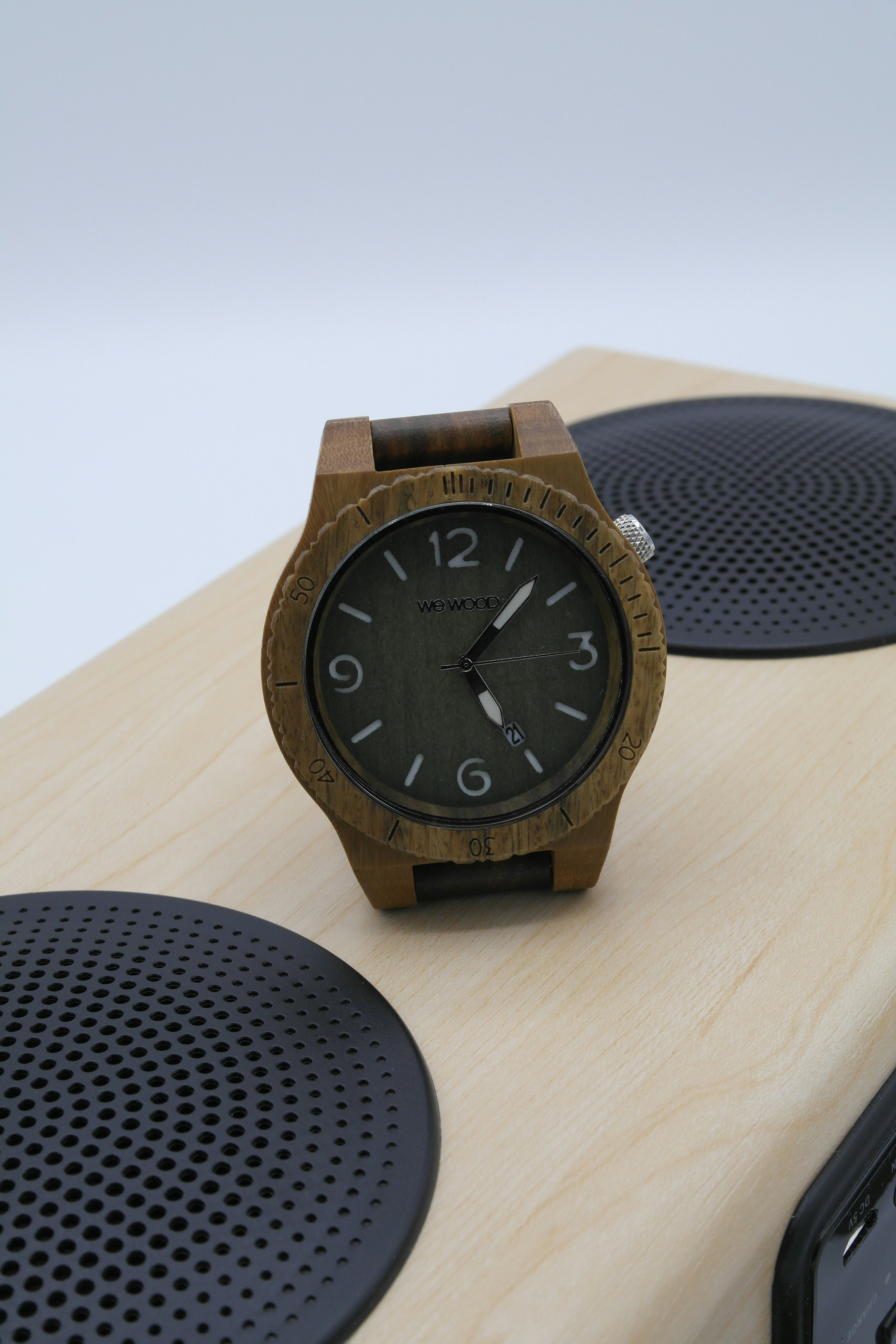 brown analog watch at 10 00