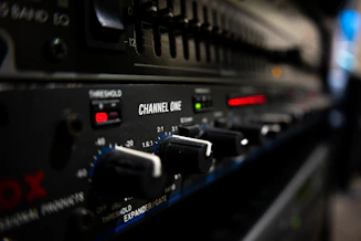 black audio mixer turned on in close up photography