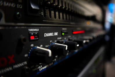 black audio mixer turned on in close up photography