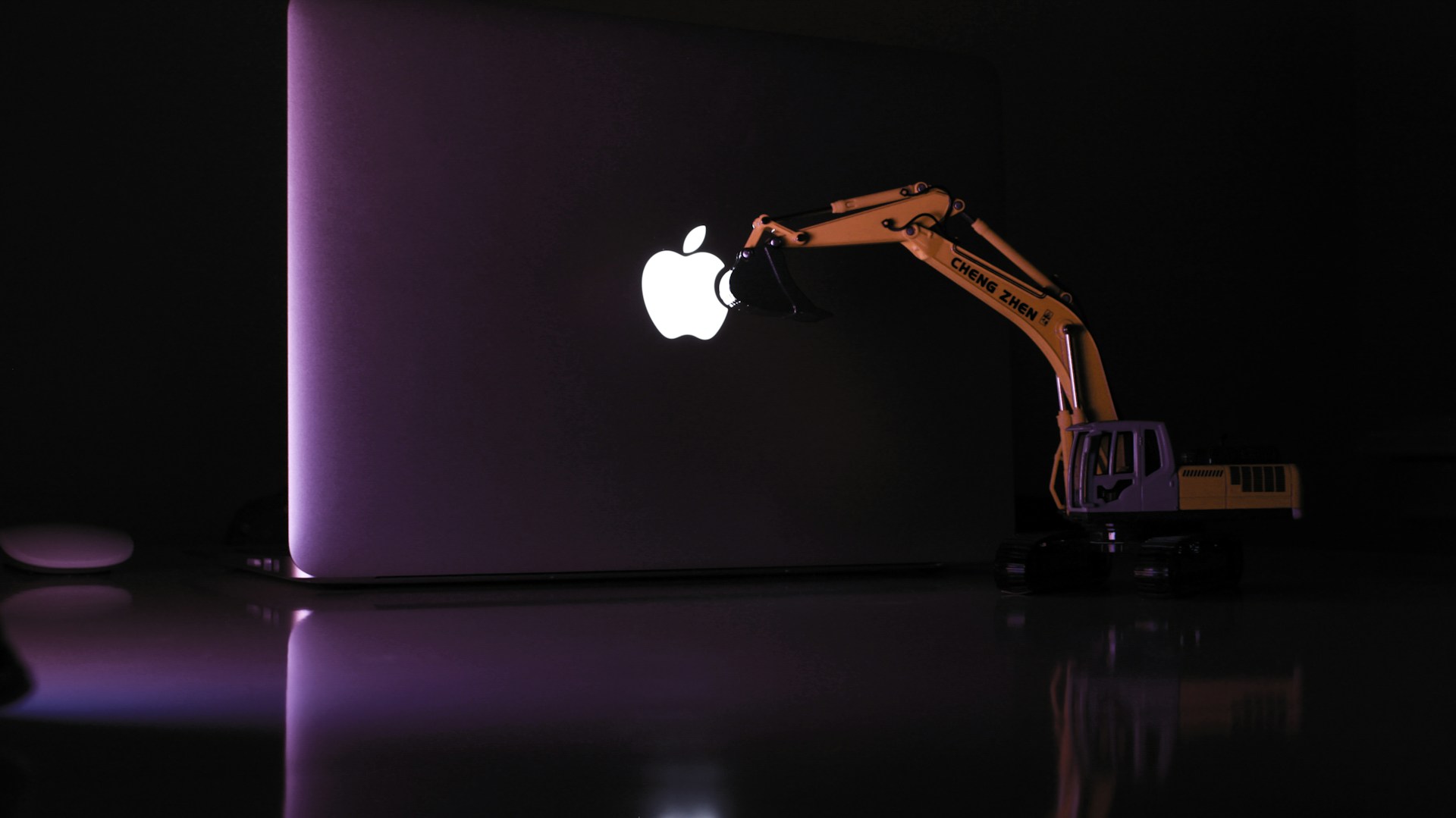 silver apple logo on black background