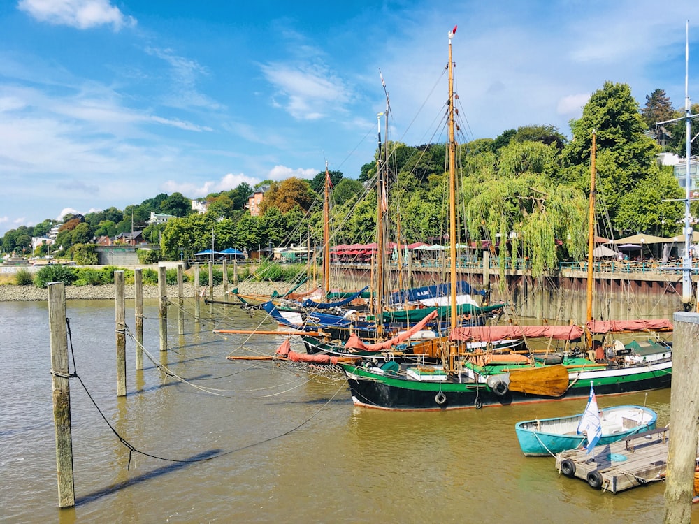 boats on dock during daytime