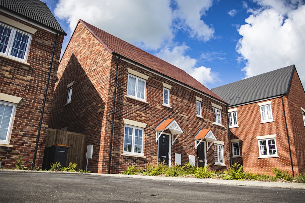 brown brick building under blue sky during daytime