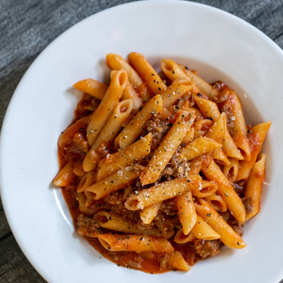 Large bowl of pasta with tomato sauce for a crowd
