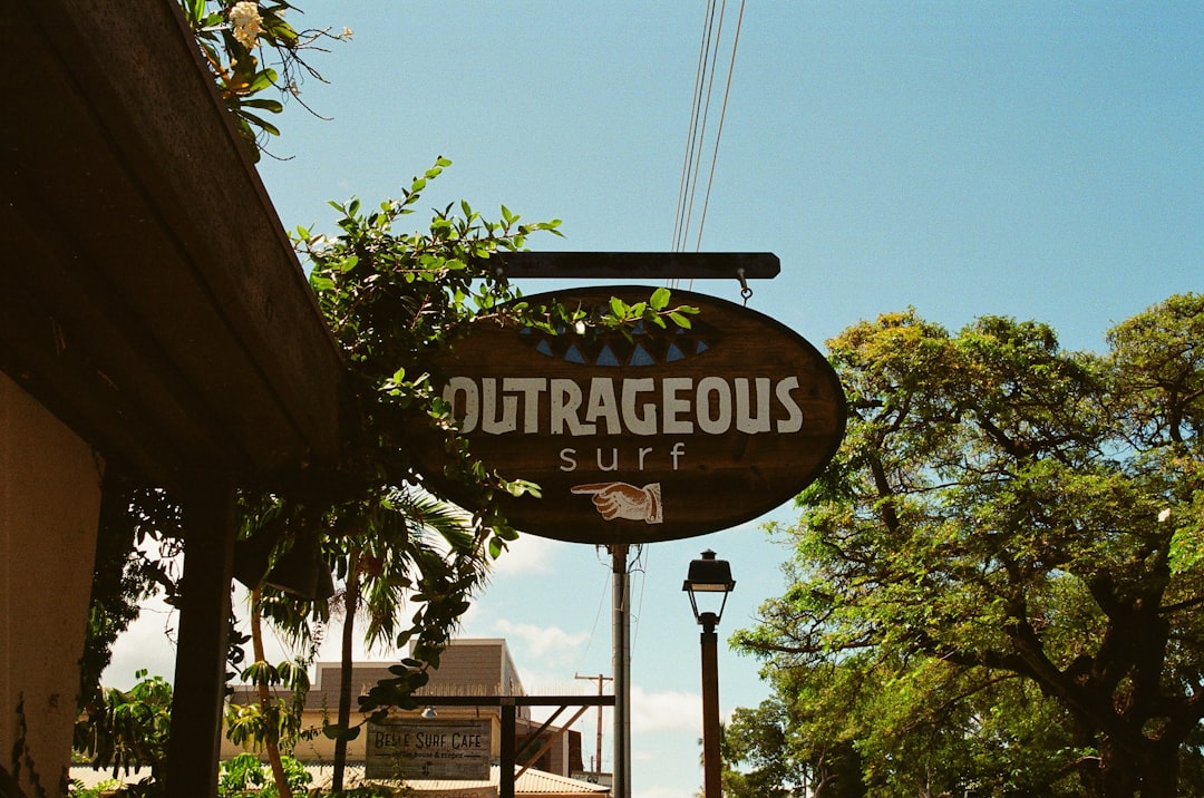 brown and white wooden signage