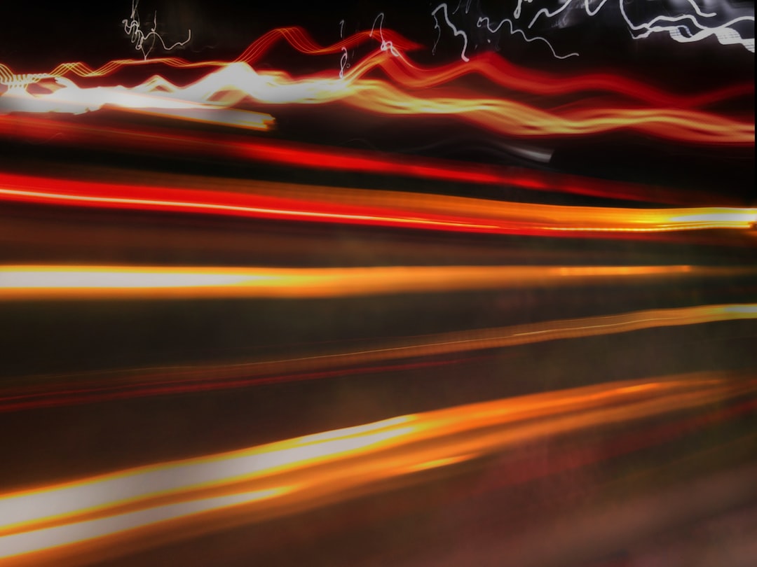 time lapse photography of cars on road during night time