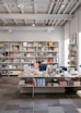 books on white wooden shelf