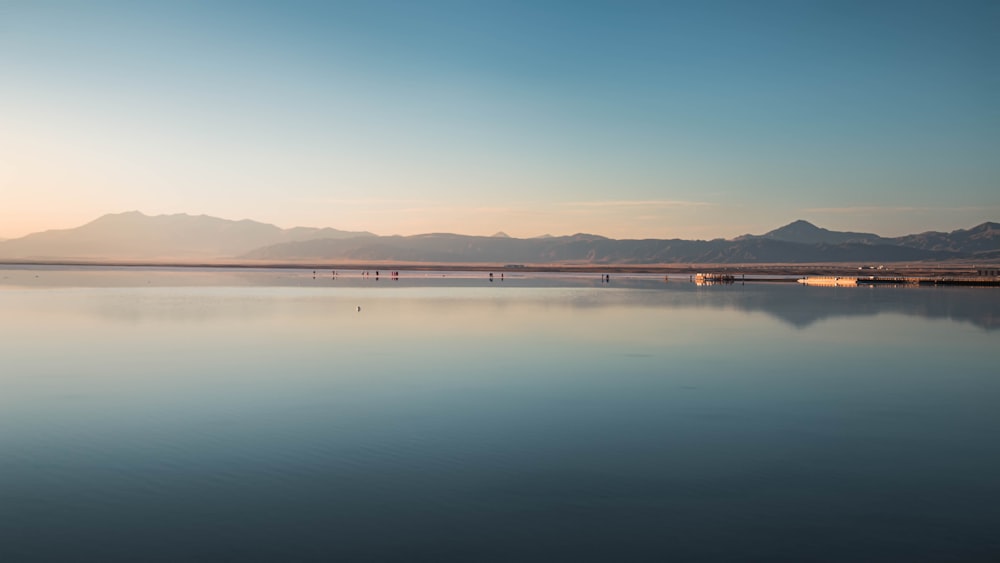 body of water under blue sky during daytime