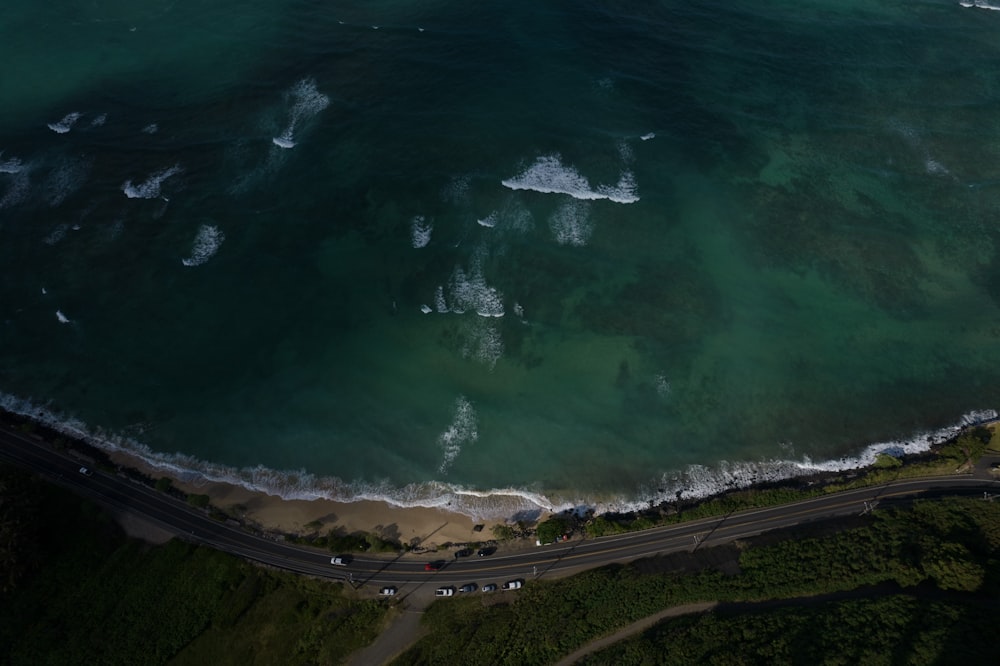 aerial view of green body of water during daytime