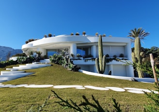 white concrete building under blue sky during daytime