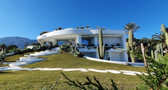 white concrete building under blue sky during daytime