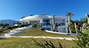white concrete building under blue sky during daytime