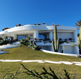 white concrete building under blue sky during daytime