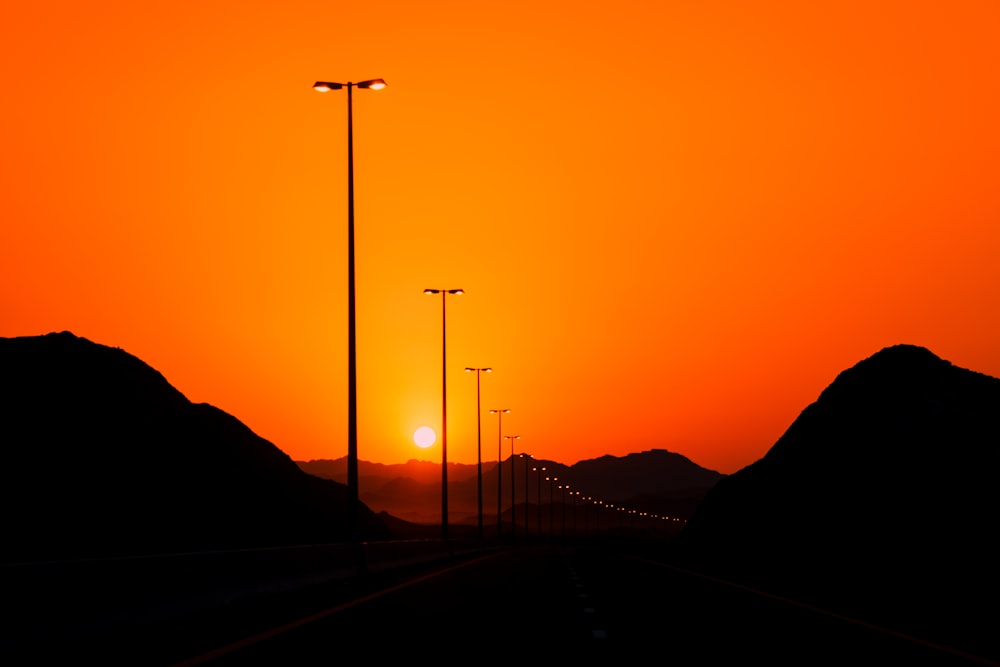 silhouette of mountain during sunset