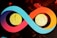 Two cryptocurrency coins, Ethereum and Bitcoin, are prominently displayed within a colorful infinity loop design. The Ethereum coin is positioned on the left, and the Bitcoin coin is on the right, both appearing gold and metallic against the vibrant swirling background of blue, red, and orange.