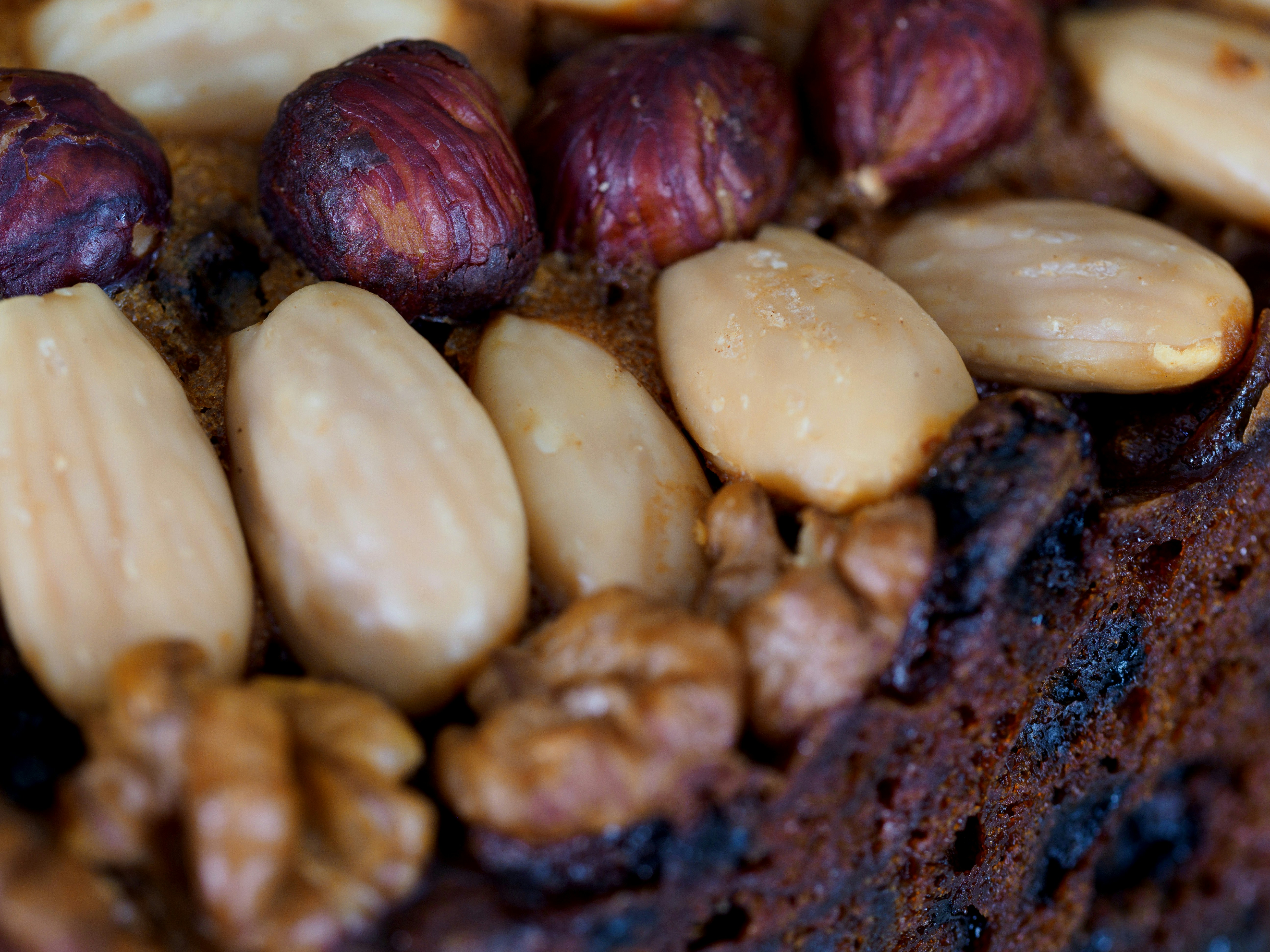 brown and white beans on brown wooden table