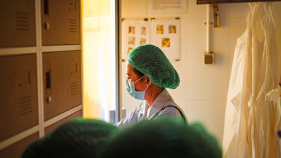 person in green knit cap