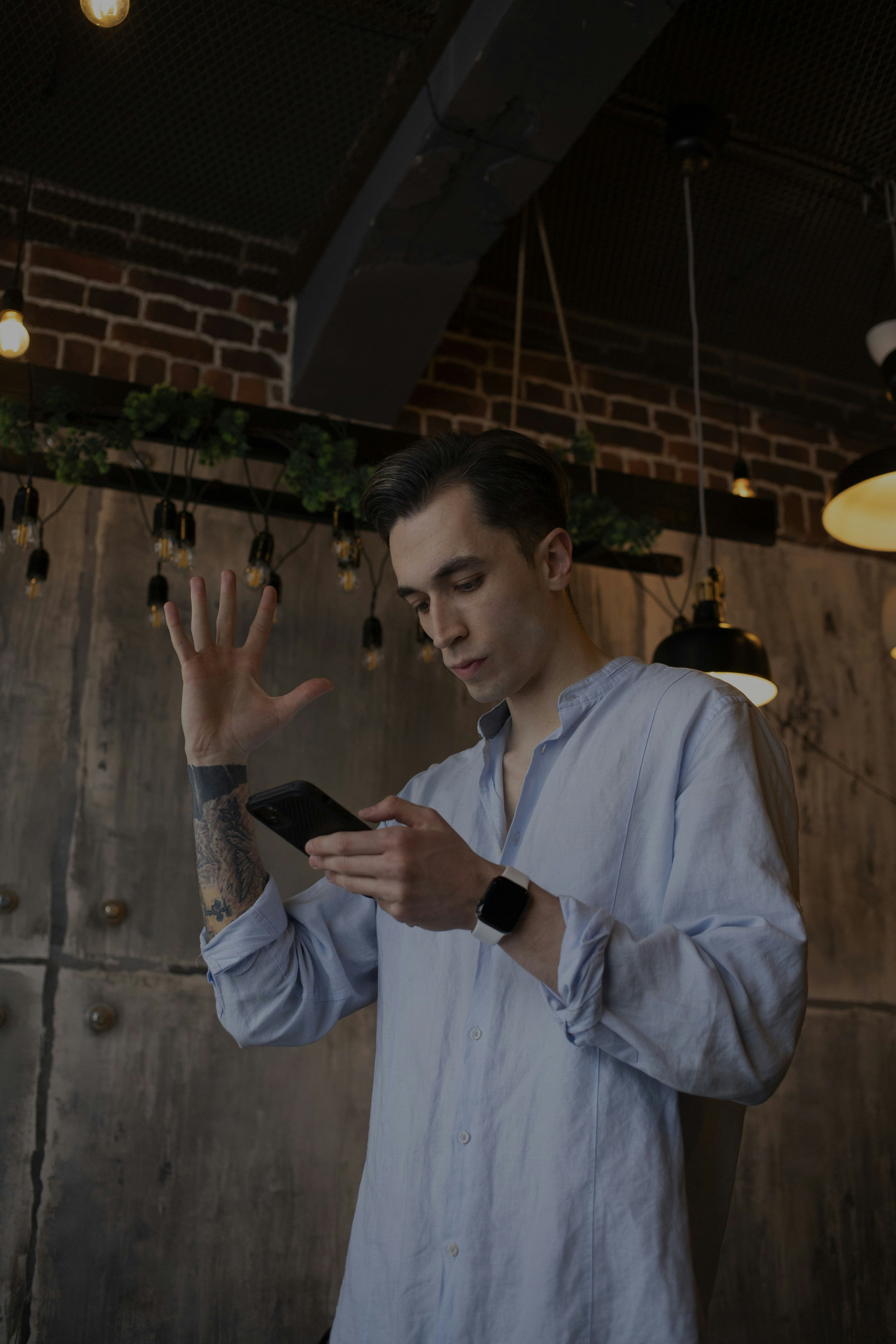 An individual experiencing seamless user experience while using a mobile phone