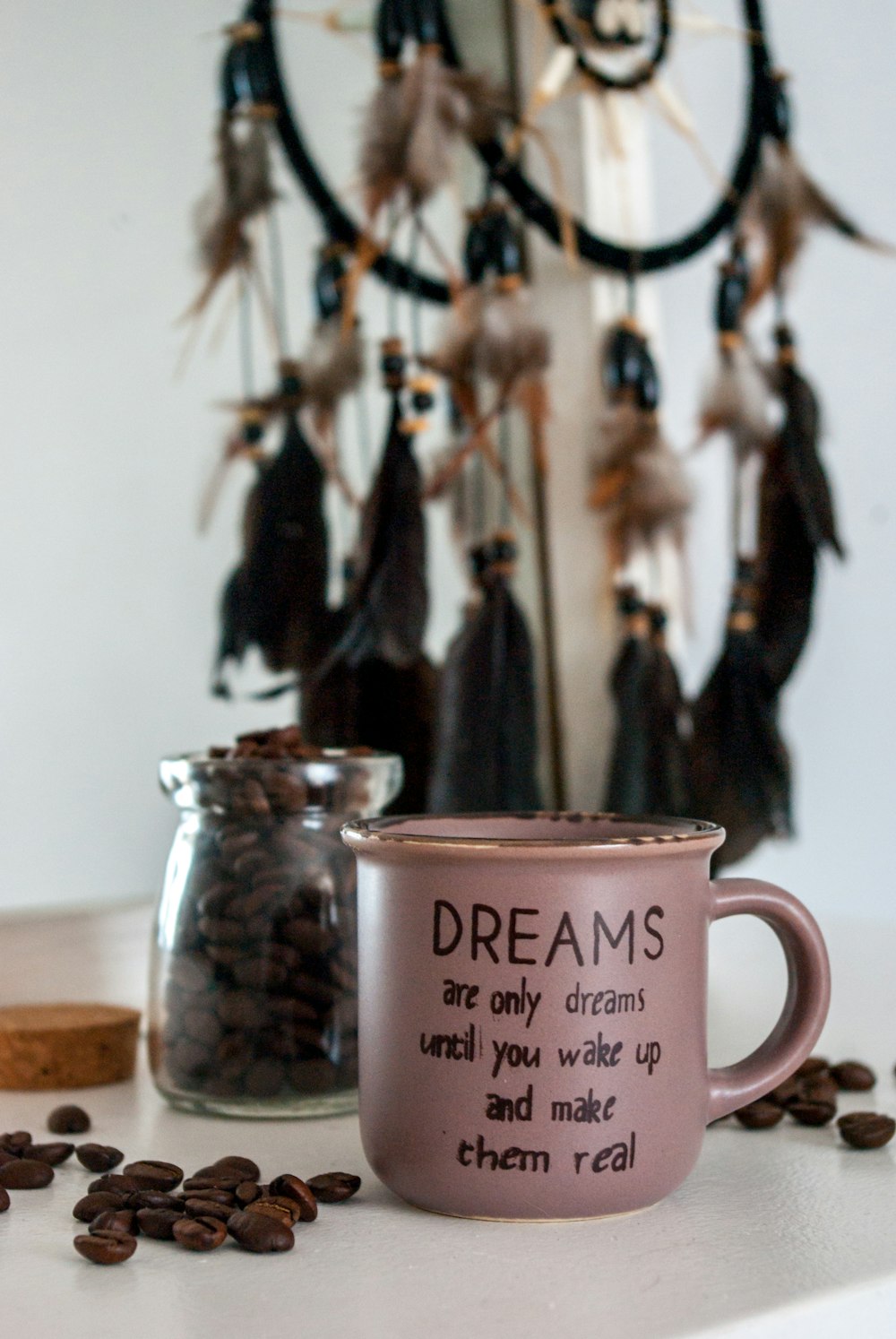 pink ceramic mug on brown wooden table