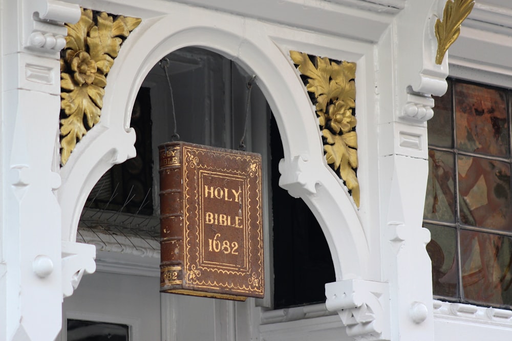 brown wooden wall mounted signage