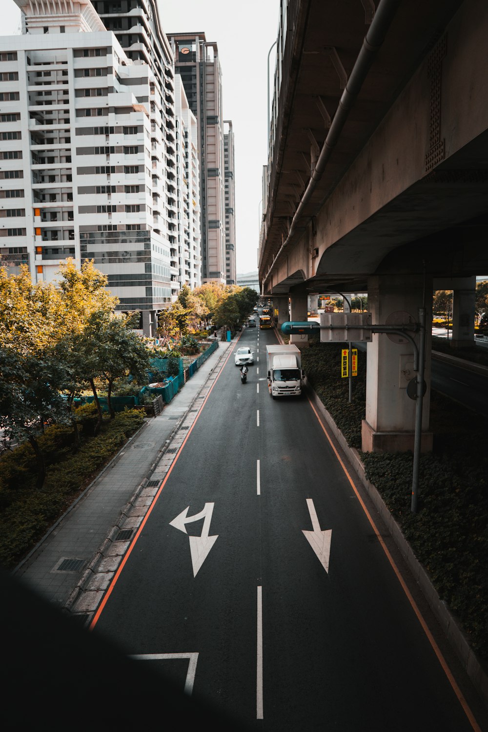 white car on road during daytime