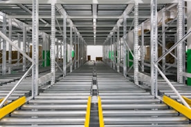 gray and yellow metal bridge