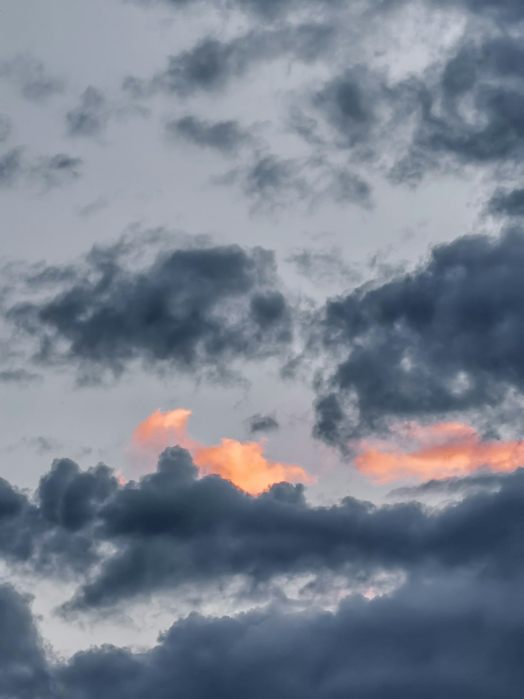 black clouds and blue sky