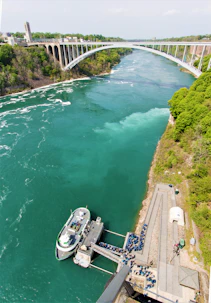 aerial view of white boat on river during daytime