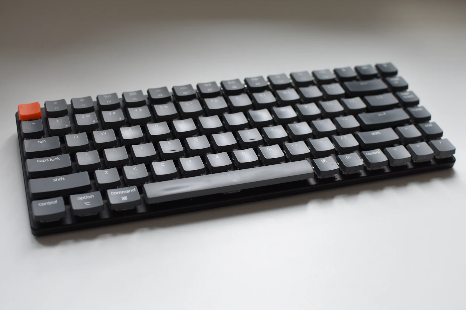 Keychron keyboard close on white desk