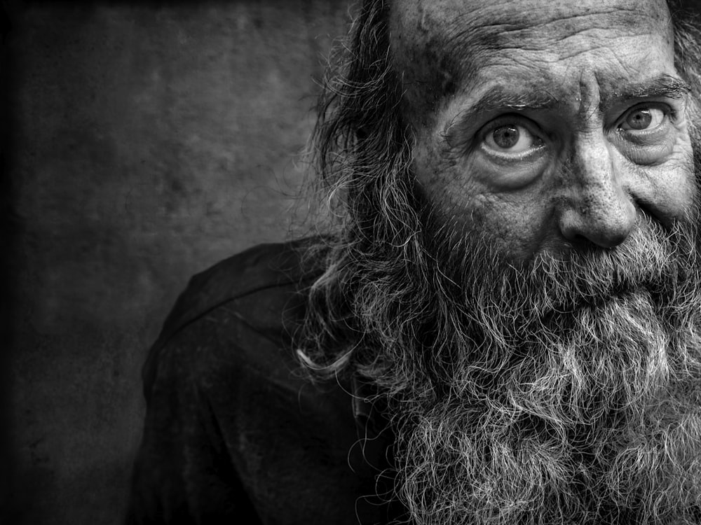 man in black shirt in grayscale photography