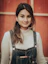 woman in white long sleeve shirt and blue denim dungaree