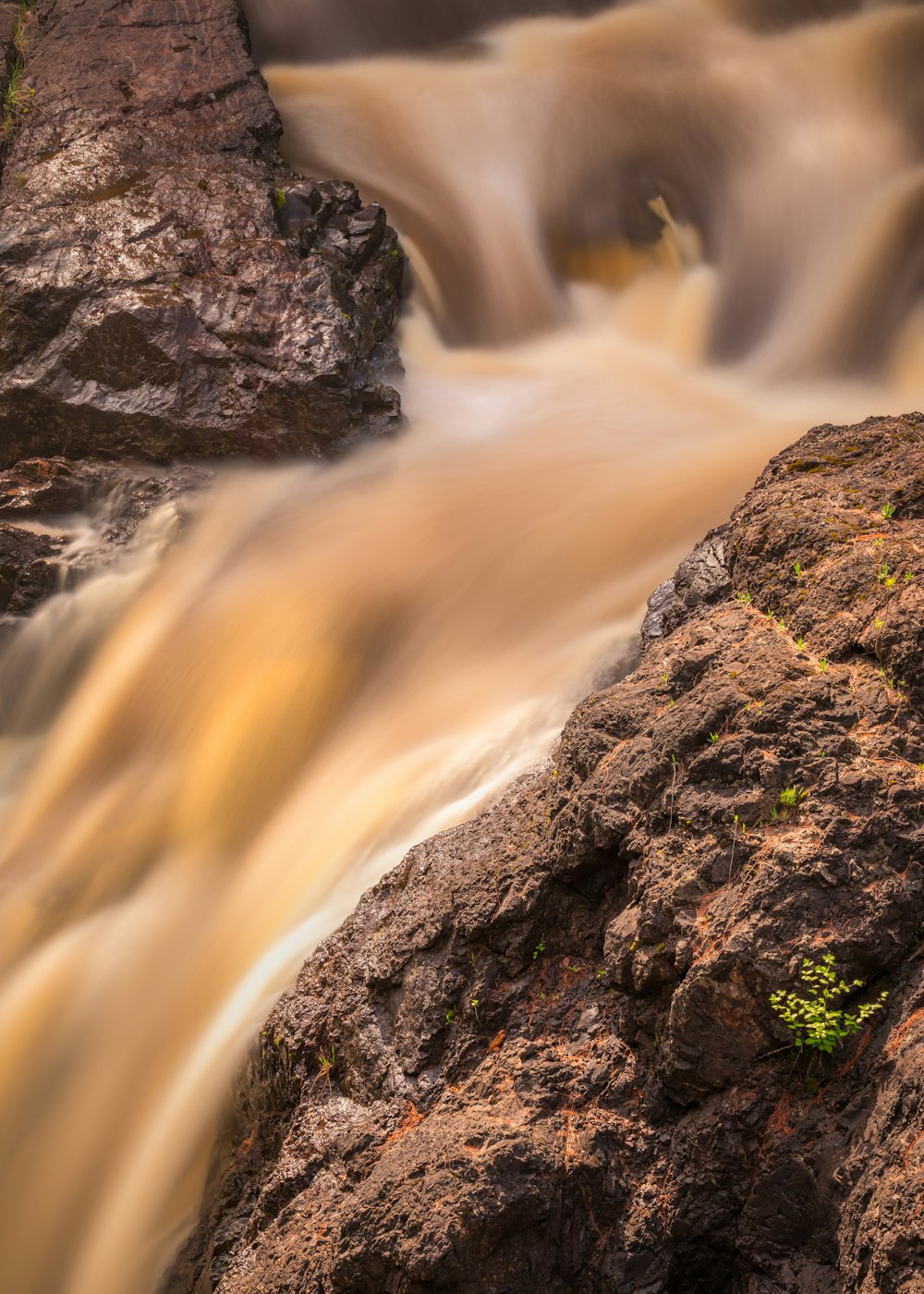 time lapse photography of water falls