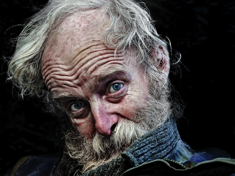 man in blue and white sweater