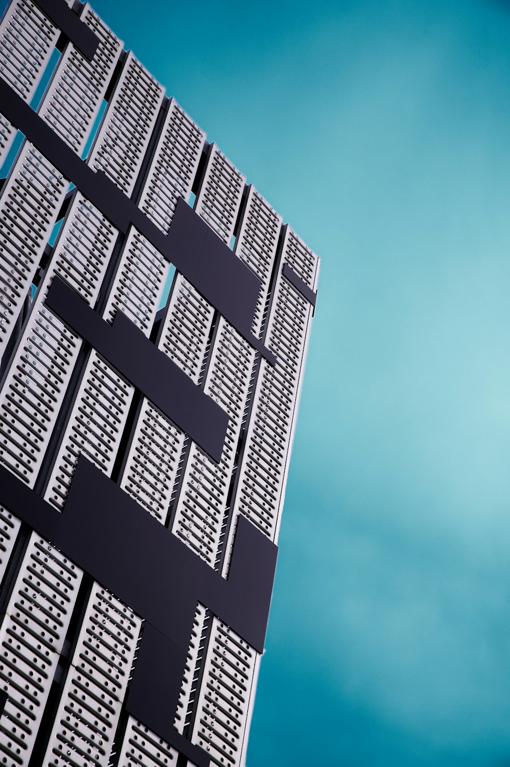 white concrete building under blue sky