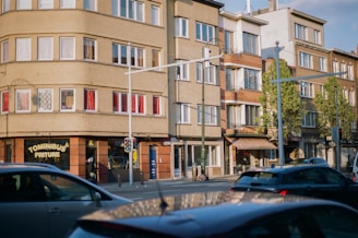 Urban Congolese street view with several bs express kiosks visible.