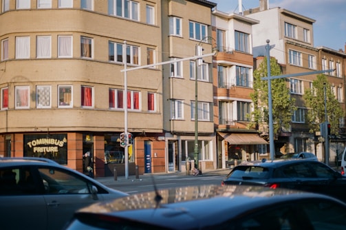 Urban Congolese street view with several bs express kiosks visible.