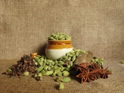 green and brown plant on white ceramic pot