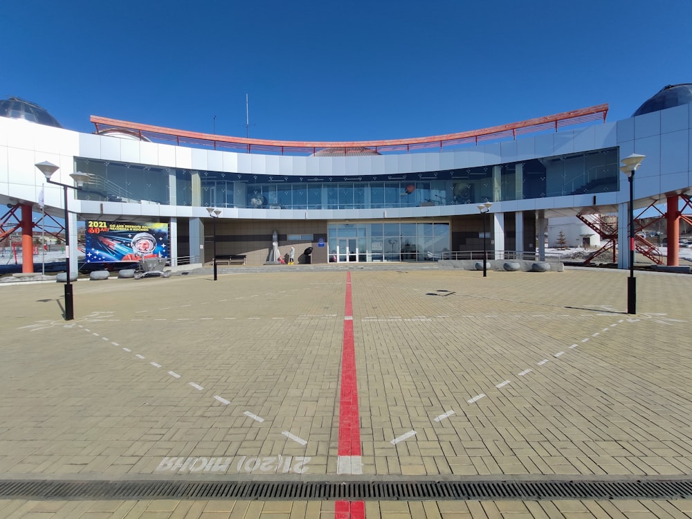 cars parked in front of building during daytime