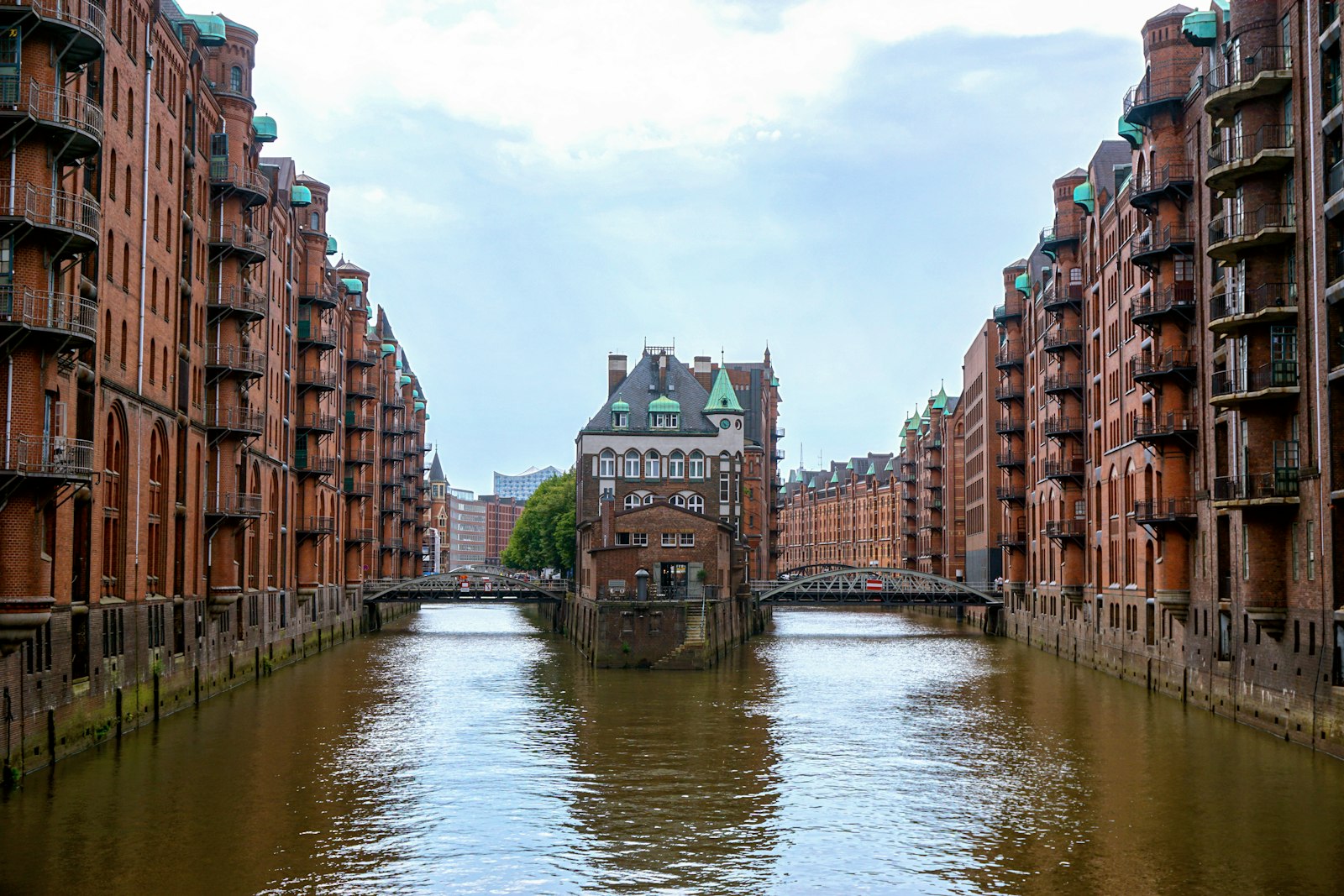 Red-brick warehouses lining a canal in Hamburg's Speicherstadt