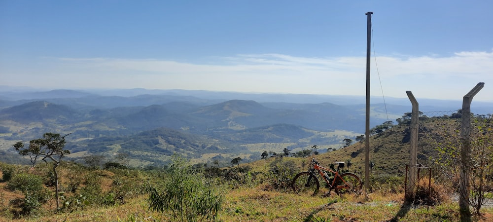 green grass field and mountain view during daytime