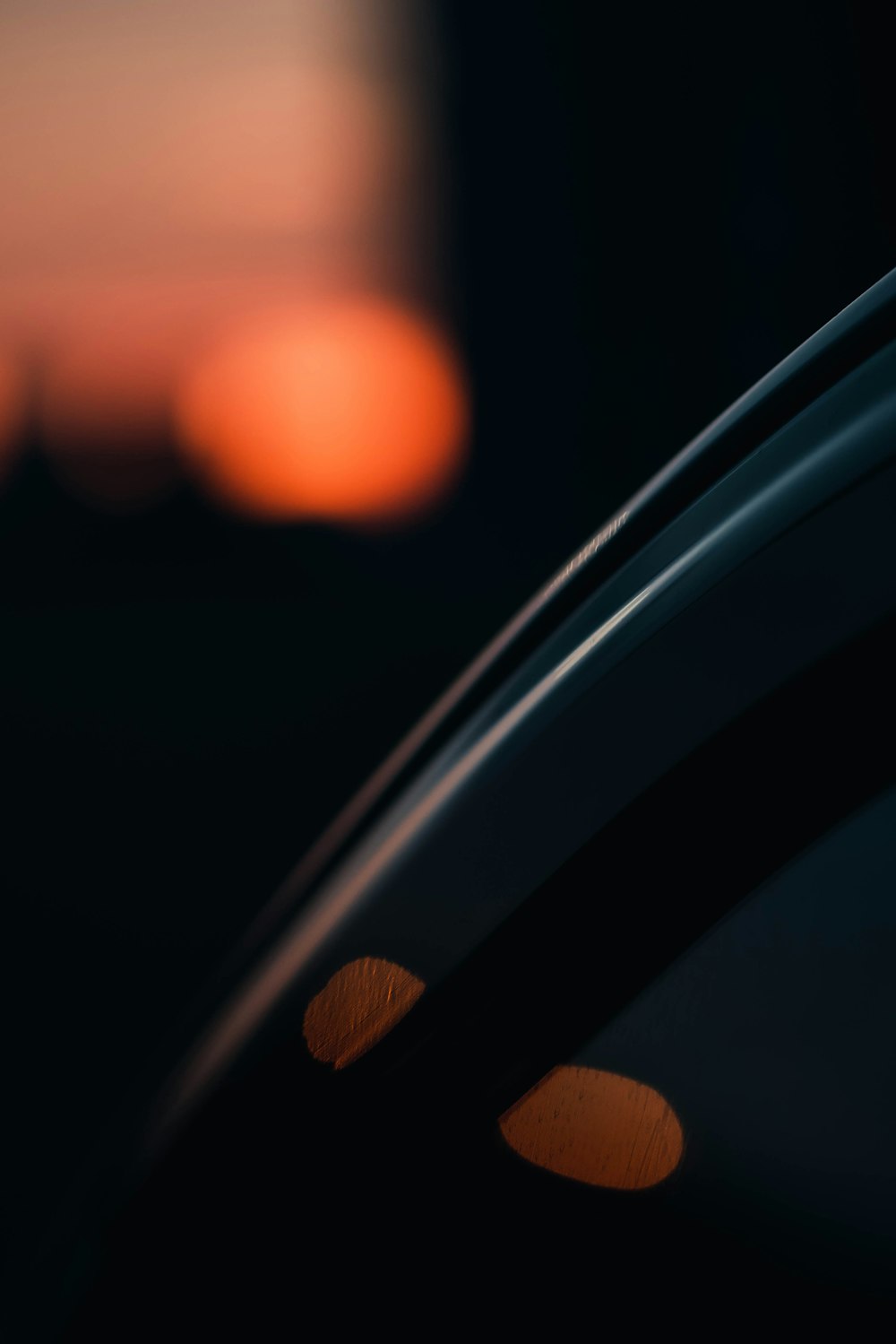 person holding car door handle