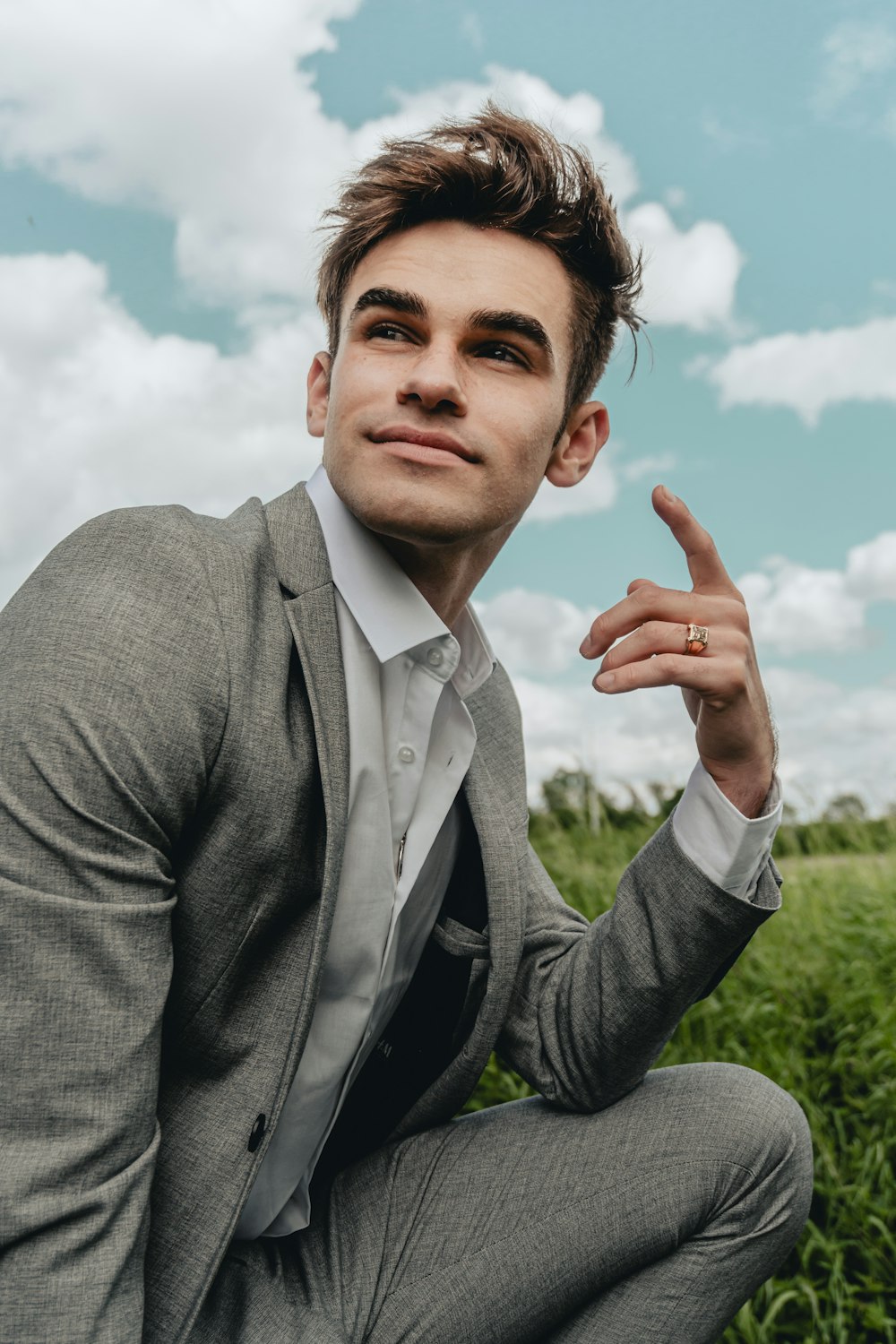 man in gray suit jacket