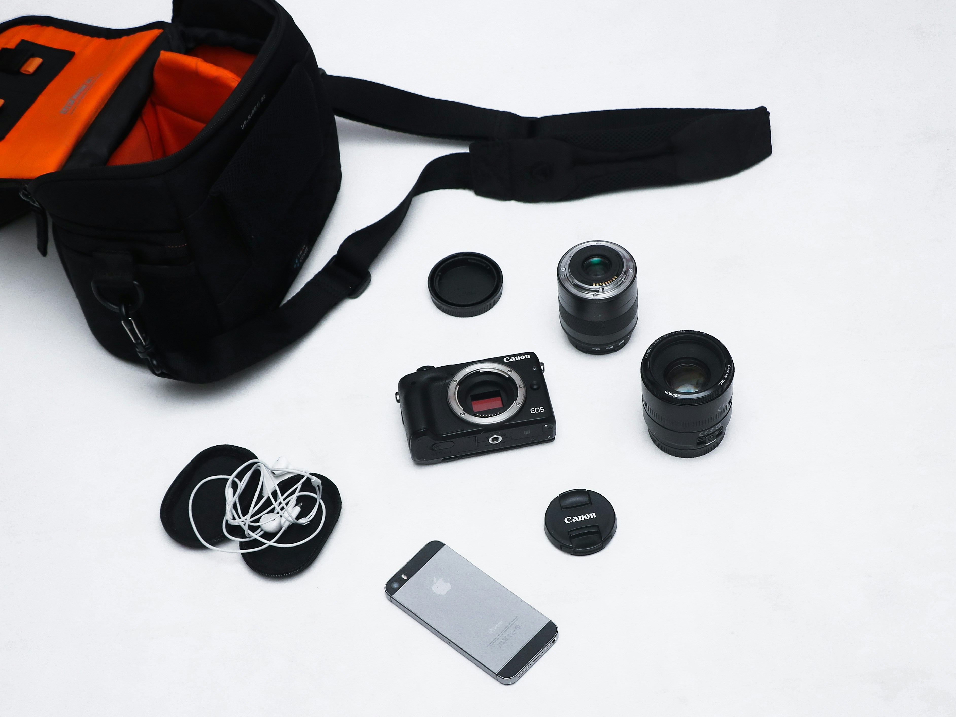 Camera lens and photography gear flatlay