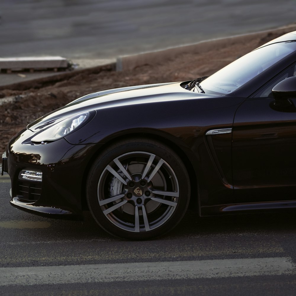 black porsche 911 on road during daytime