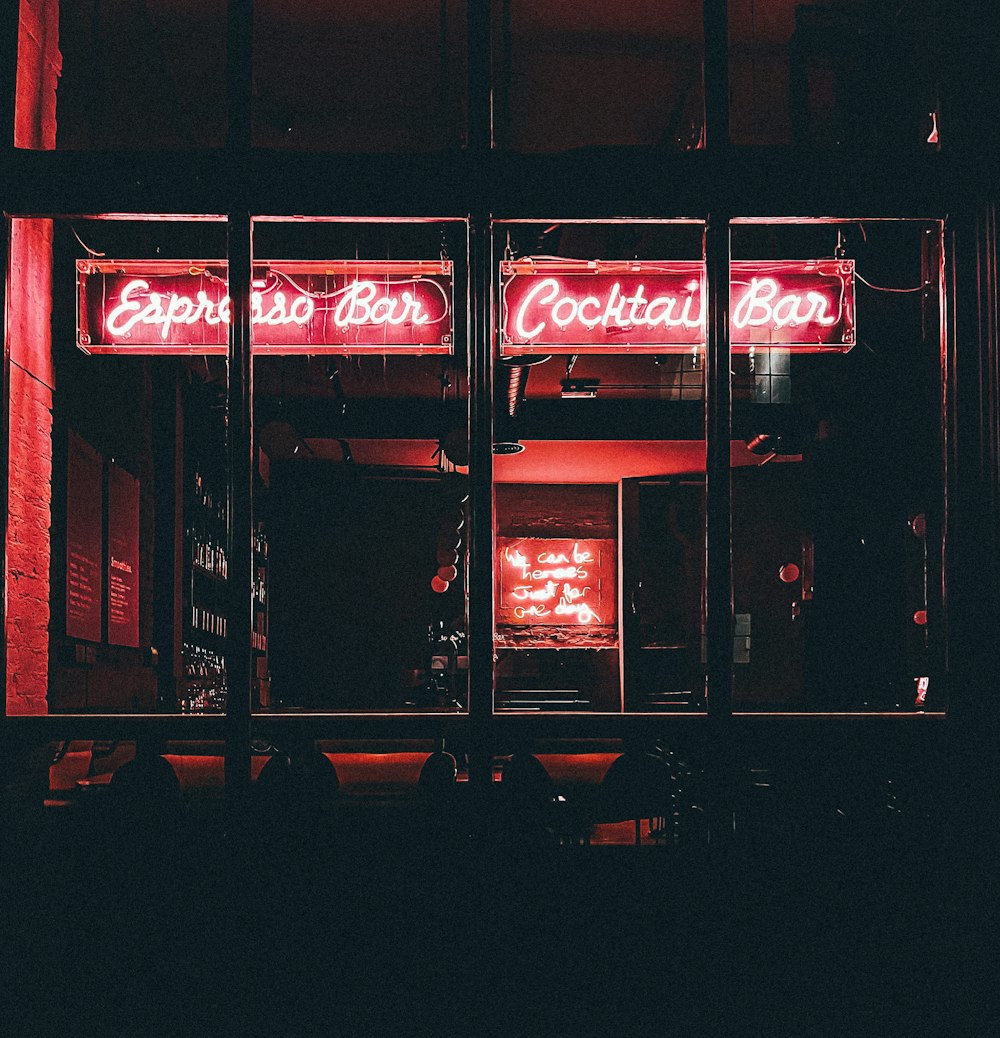 red and white coca cola neon signage