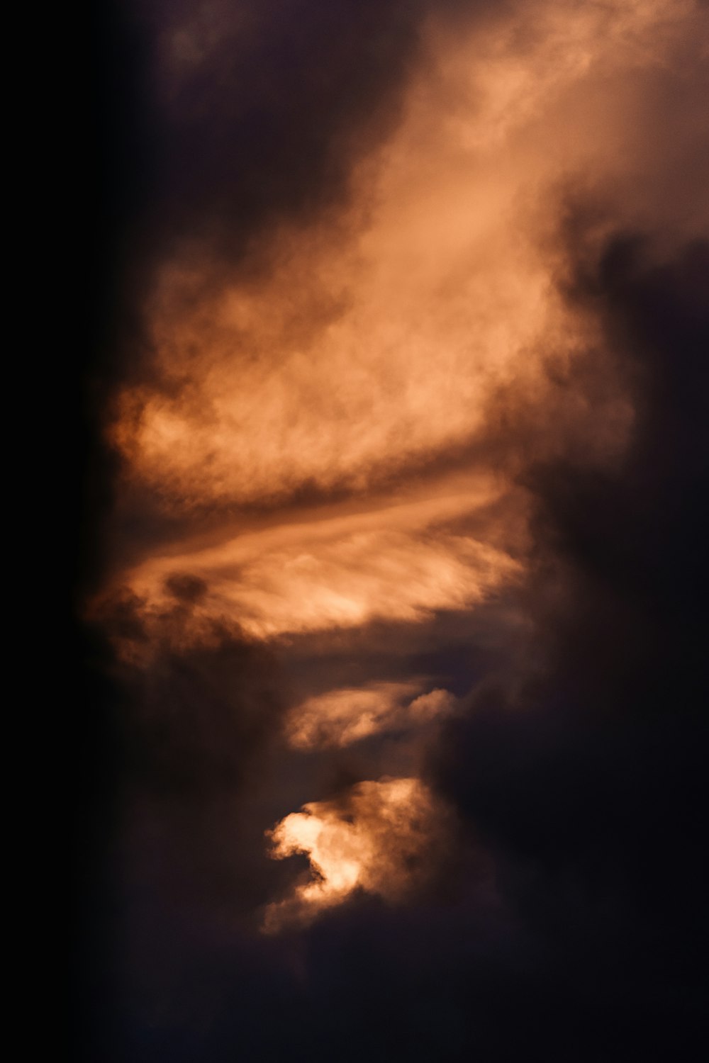 black clouds and blue sky