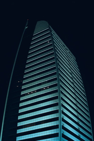 gray concrete building during night time