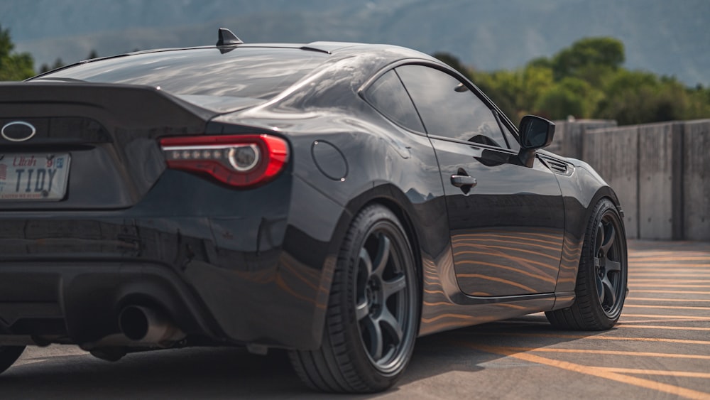 black porsche 911 on road during daytime